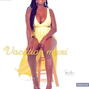 Yellow long maxi dress with two cut outs on sides and two high spilts